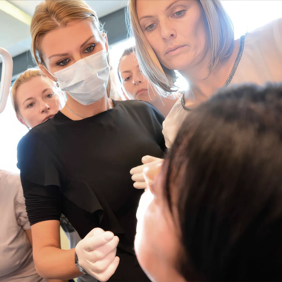 Portrait of Dr Ivona Igerc (Dr. Ivy) London performing a treatment